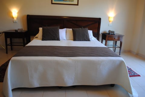 Standard Double or Twin Room | Minibar, desk, free WiFi, bed sheets