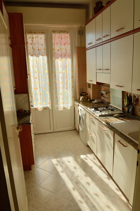 modern and bright kitchen with balcony