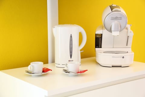 Deluxe Suite, 1 Queen Bed | Private kitchenette | Espresso maker, coffee/tea maker, electric kettle