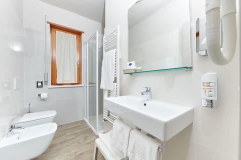 Shower, rainfall showerhead, eco-friendly toiletries, hair dryer