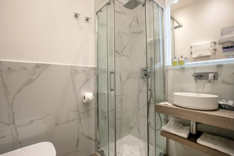 Double or Twin Room, Sea View | Bathroom | Shower, rainfall showerhead, free toiletries, hair dryer