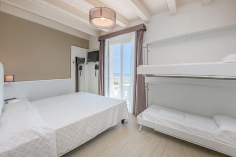 Quadruple Room, 1 Bedroom, Sea View | In-room safe, desk, blackout drapes, free WiFi