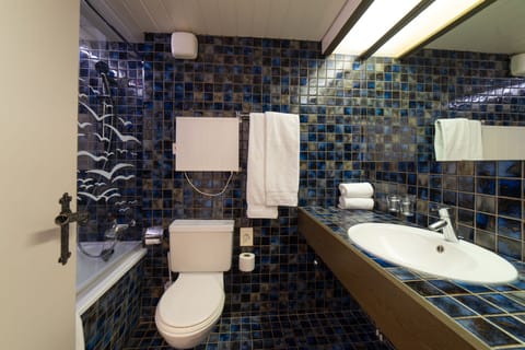 Double Room (Churfirsten) | Bathroom | Combined shower/tub, deep soaking tub, hair dryer, towels