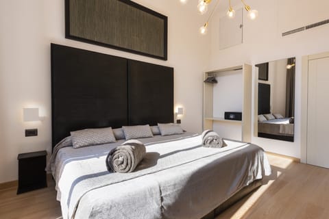 Premium bedding, down comforters, in-room safe, individually furnished