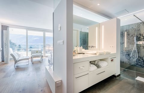 Panoramic Suite | Bathroom | Hair dryer, bathrobes, slippers, bidet