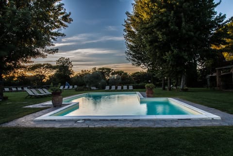 Seasonal outdoor pool, pool umbrellas, sun loungers