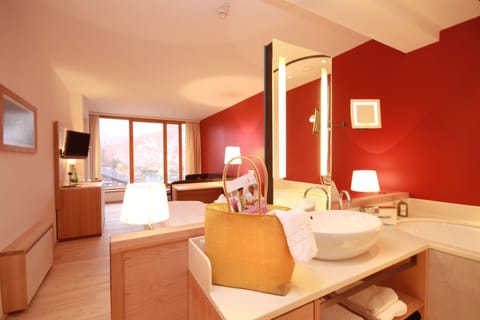 Junior Suite, Balcony | Bathroom | Hair dryer, bathrobes, slippers, towels