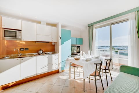 Family Apartment, 2 Bedrooms, Kitchenette, Ocean View | Private kitchen | Full-size fridge, microwave, stovetop, coffee/tea maker