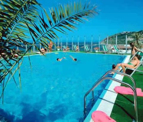 Seasonal outdoor pool, open 8:30 AM to 7:00 PM, sun loungers