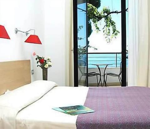 Superior Double Room, Balcony, Sea View | Down comforters, minibar, in-room safe, desk