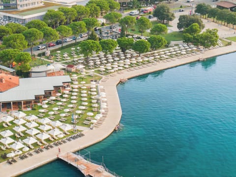 On the beach, sun loungers, beach umbrellas, beach massages