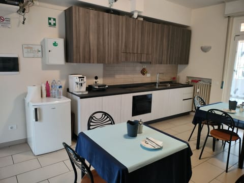 Fridge, stovetop, cookware/dishes/utensils