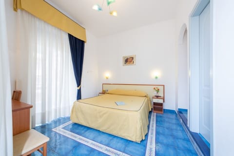 Double or Twin Room with Balcony | Minibar, in-room safe, individually decorated, individually furnished