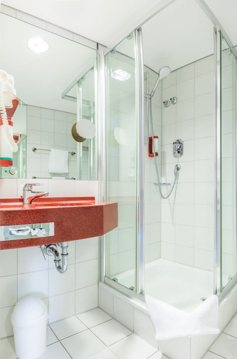 Shower, deep soaking tub, free toiletries, hair dryer