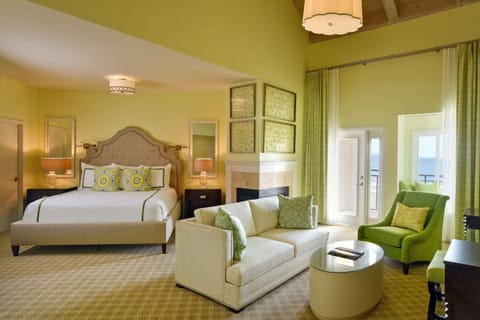 Suite, One King and One Sofa Bed, Ocean View | Premium bedding, minibar, in-room safe, desk