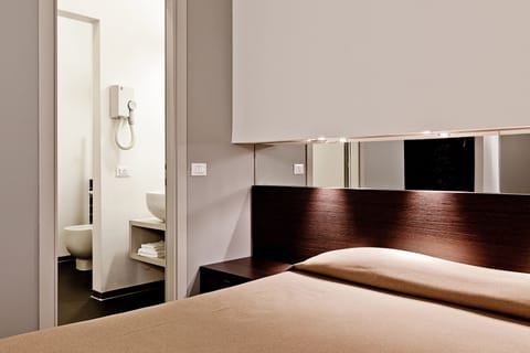 Classic Double or Twin Room | Minibar, in-room safe, desk, laptop workspace