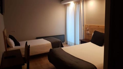 Comfort Triple Room | 1 bedroom, premium bedding, desk, blackout drapes