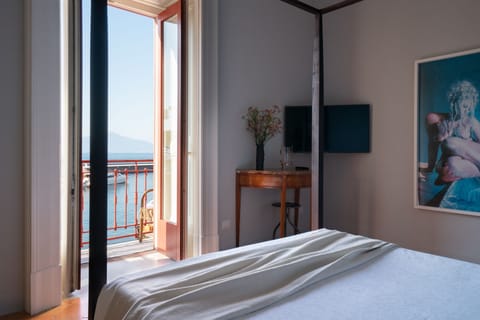 Deluxe Double Room, Balcony, Sea View | Down comforters, minibar, in-room safe, iron/ironing board