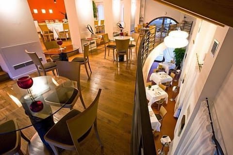 Breakfast, lunch, dinner served; Italian cuisine, garden views 