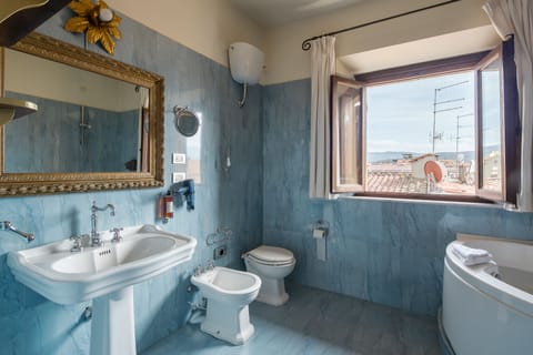 Superior Suite | Bathroom | Hair dryer, slippers, bidet, towels