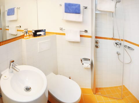 Shower, free toiletries, hair dryer, towels