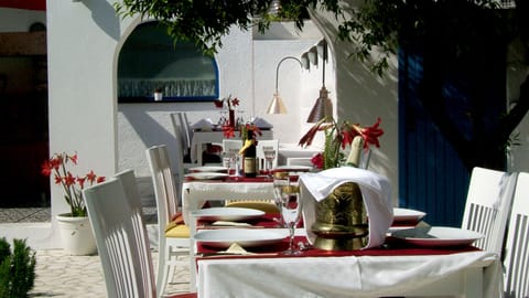 Breakfast, lunch, dinner served; Mediterranean cuisine, pool views 