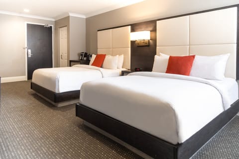 Standard Room, 2 Queen Beds, Ground Floor | Egyptian cotton sheets, premium bedding, pillowtop beds, in-room safe