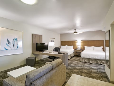 Suite, 2 Double Beds | In-room safe, desk, iron/ironing board, free cribs/infant beds