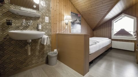 Basic Single Room, Shared Bathroom | Premium bedding, memory foam beds, in-room safe, desk