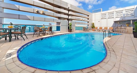 Outdoor pool, open 9:00 AM to 6:00 PM, sun loungers