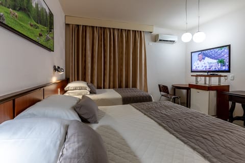 Deluxe Triple Room | In-room safe, desk, blackout drapes, free WiFi