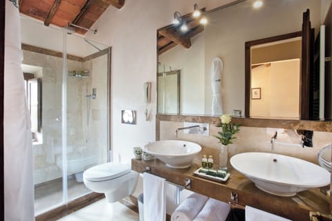 Doppia Superior | Bathroom | Designer toiletries, hair dryer, bathrobes, slippers