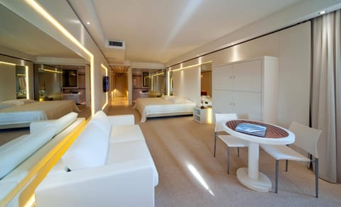 Select Comfort beds, minibar, in-room safe, desk