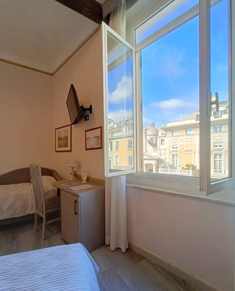 Triple Room | Down comforters, minibar, desk, blackout drapes