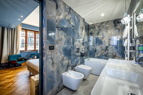 Double Room (Duomo View - 40) | Bathroom | Hair dryer, bidet, towels