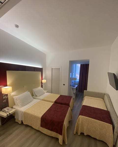 Standard Triple Room | In-room safe, desk, blackout drapes, soundproofing