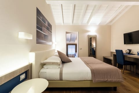 Deluxe Quadruple Room | Premium bedding, down comforters, minibar, in-room safe