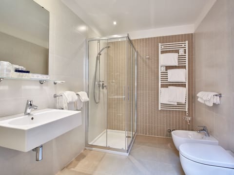 Shower, rainfall showerhead, eco-friendly toiletries, hair dryer