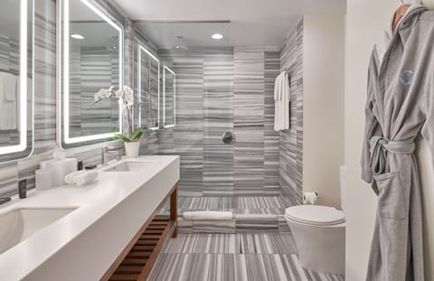 Studio Suite | Bathroom | Shower, rainfall showerhead, designer toiletries, hair dryer