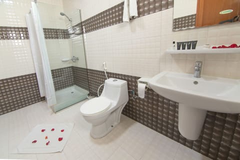 Standard Triple Room, 3 Bedrooms | Bathroom | Separate tub and shower, free toiletries, hair dryer, bathrobes