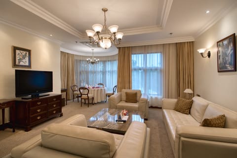 Presidential Suite, 1 King Bed | Living area | 32-inch flat-screen TV with satellite channels, TV