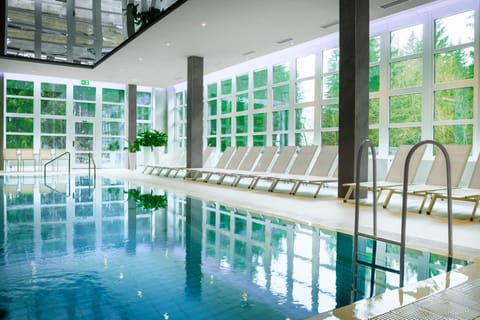 Indoor pool, open 7:00 AM to 9:00 PM, sun loungers