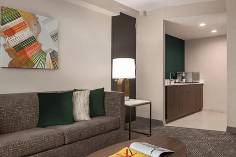 Suite, 1 Bedroom | In-room safe, desk, laptop workspace, iron/ironing board