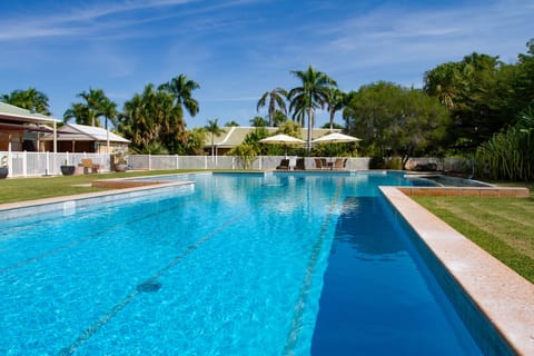 Outdoor pool, pool umbrellas, sun loungers