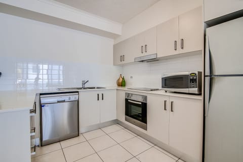 One Bedroom Apartment | Private kitchen | Full-size fridge, microwave, oven, stovetop