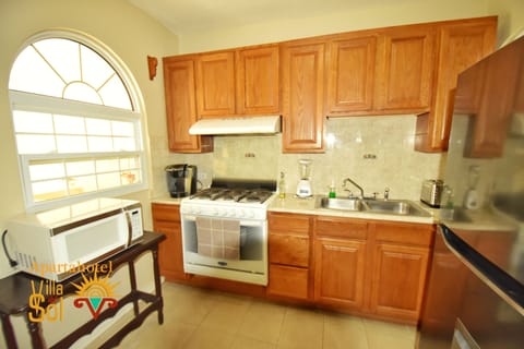 Family Apartment, 2 Bedrooms | Private kitchen | Fridge, microwave, oven, stovetop