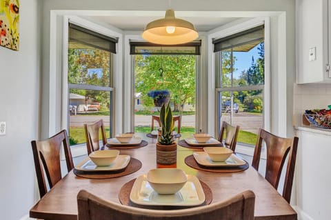The beauty of our natural light dining area, where sunshine pours in through large windows, illuminating the space with a warm and inviting glow. 
