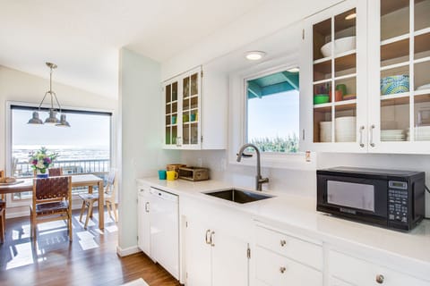 Bright and airy galley kitchen for family meals.