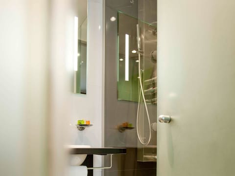 Shower, eco-friendly toiletries, hair dryer, towels