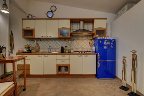 Apartment, 1 Bedroom | Private kitchenette | Full-size fridge, microwave, cookware/dishes/utensils